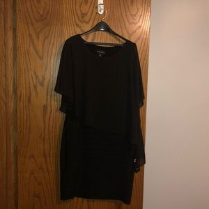 Black evening dress with build in shawl.